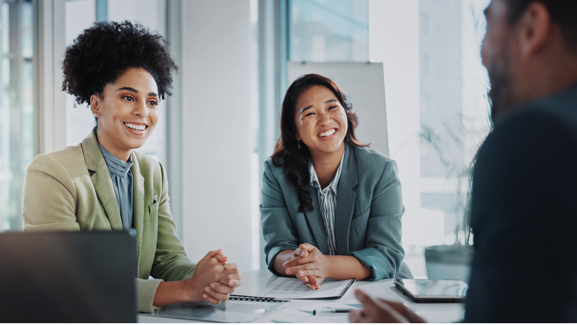 Professionals discussing outsourced HR support for growing businesses.